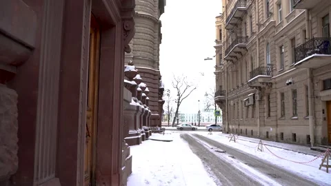 Winter snow-covered streets of St. Petersburg, falling snow Stock Footage 148552874