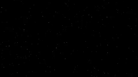 Winter snow fall effect, snowflakes slowly fall rightwards on black background. Stock Footage 114627898