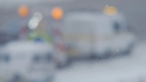 Winter. Snow Falling. Road Works Sign &amp; Car on Background. 動画素材 87247045