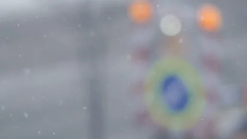 Winter. Snow Falling. Road Works on Background. Slow-Mo. 動画素材 87247050
