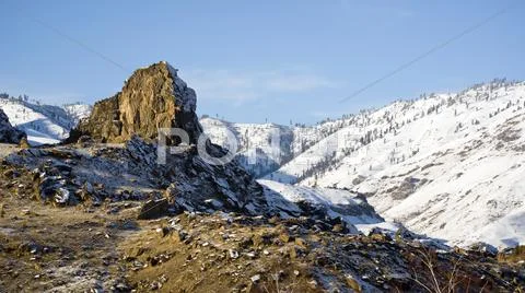Winter snow at the peaceful butte Stock Photos