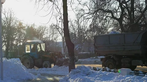 Winter snow removal  in city. Stock Footage 59795626