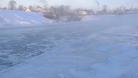 Winter snow river landscape. Rural scene. Ice floats on the river Stock Footage 142790780