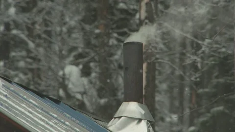 Winter Snow Storm Cabin Smoke Chimney CU Stock Footage