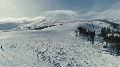 Winter Snowboarding and Ski drone flight in mountains skilift above elevator and Stock Footage 85541501