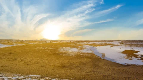 Winter snowbound prairie at the sunset time lapse scene Stock Footage 249149910