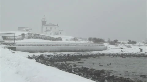 Winter snowfall and lighthouse Stock-Footage 47676311