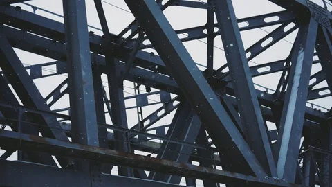 Winter snowfall on the background of the railway bridge on the river Video stock 99591241