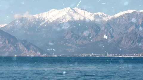 Winter Snowfall on Coastal Mountain View Seascape Nature Animation Stock Footage 330278874