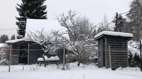 Winter snowfall in the village Stock Footage 328165458