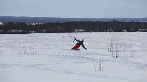Winter snowkiting on the field Stock Footage 61380346