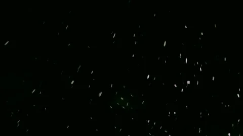 Winter softly falling snowflakes against dark night sky. Stock Footage 310250539