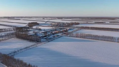 Winter Solitude Aerial View of a Remote Northern Chinese Village Surrounded Stock Footage 328291643