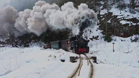 Winter steam train Mocanita from Romania Stock Footage