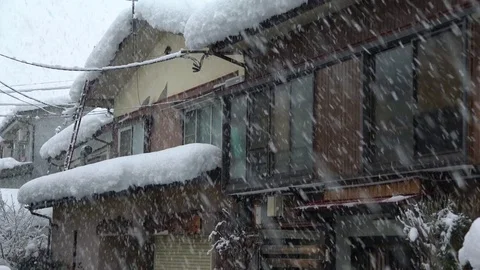 Winter Storm Blankets Buildings With Deep Layer Of Snow Video stock 72017848