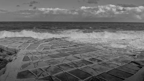 Winter Storm Brings Dramatic Waves to the Shoreline back and white image Stock Photos