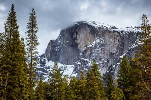 Winter Storm Clouds at Dusk on Half Dome, Yosemite National Park, California Stock Photos