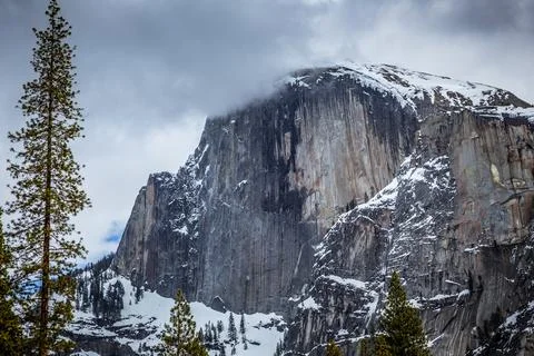 Winter Storm Clouds at Dusk on Half Dome, Yosemite National Park, California Stock Photos