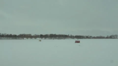 Winter storm time-lapse on frozen lake Stock Footage 42802201