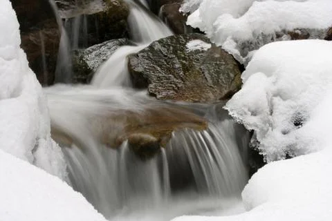 Winter stream Stock Photos