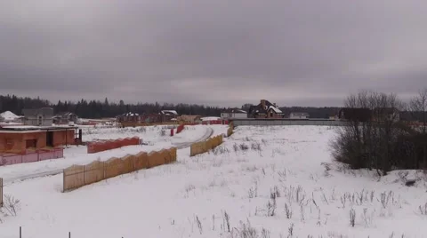 Winter suburban gated development under construction Stock Footage 61379192