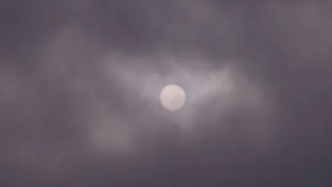 Winter sun with passing clouds Stock Footage 143528069