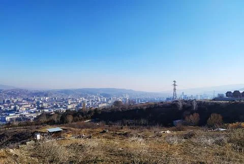 Winter sunny cloudless sky over the city Stock Photos