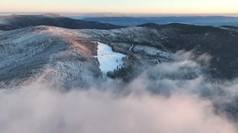 Winter Sunrise Aerial Forward Flight Above Clouds Barania Hall Stock Footage 335742661