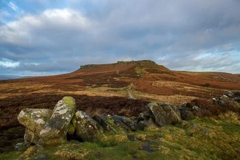 A winter sunrise view of Higger Tor in the South Yorkshire Peak District Na.. Stock Photos