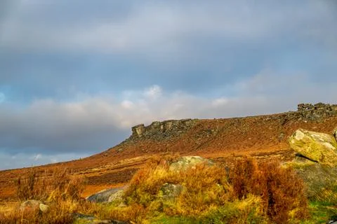 A winter sunrise view of Higger Tor in the South Yorkshire Peak District Na.. Stock Photos