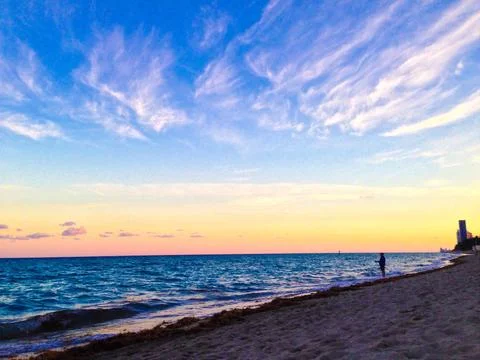 Winter sunset at the beach Stock Photos