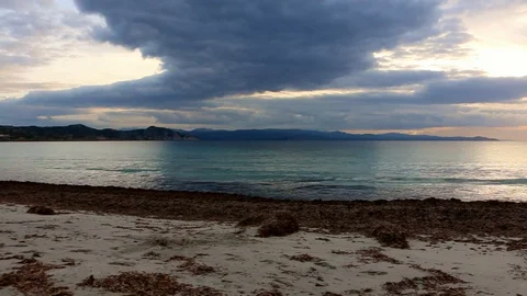 Winter sunset on desolate beach Stock Footage 128933411