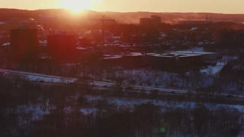 Winter sunset glows over Hamilton, tighter lens gives more parallax effect. The Stock-Footage 327534435
