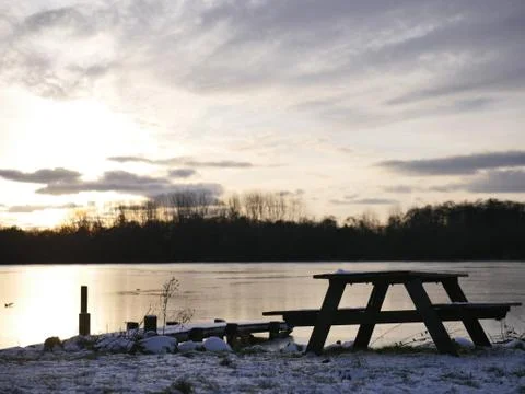 Winter Sunset at a Lake Stock Photos