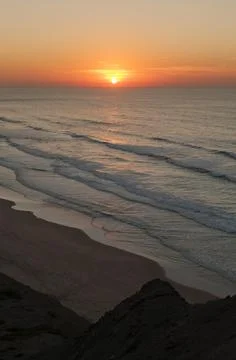 Winter sunset looking over the Atlantic from western Algarve, Portugal Stock Photos