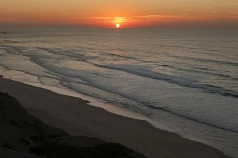 Winter sunset looking over the Atlantic from western Algarve, Portugal. Stock Photos