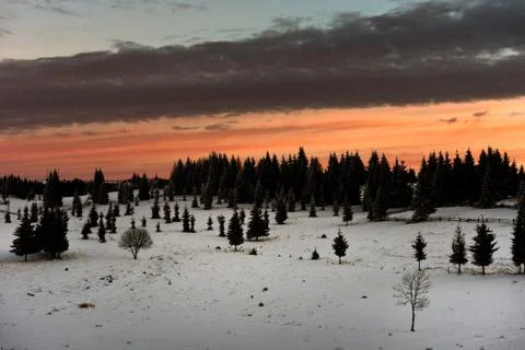Winter sunset in the mountains Stock Photos
