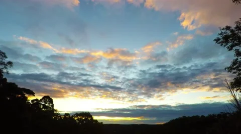 Winter Sunset with Moving Cloud Formations Stock Footage 64644092