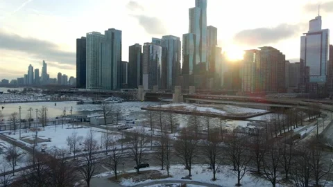 Winter Sunset over Chicago Downtown buildings seen from the Navy Pier Stock Footage 170881073