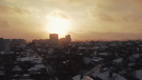 Winter sunset over the city, sun 스톡 동영상 167665232