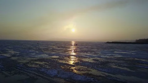 Winter sunset over the frozen river Stock Footage 73000703