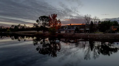 Winter Sunset over Lake and Waterfowl Timelapse Stock Footage 283976471