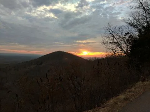 Winter Sunset over the Mountain Stock Photos