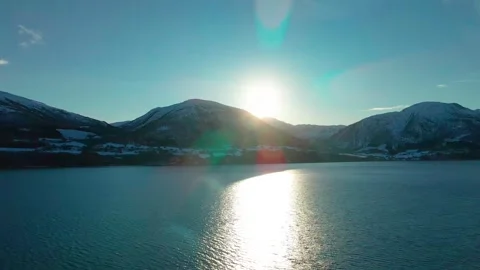 Winter Sunset over Oppdal Lake and Mountains, Norway Stock Footage 315734874