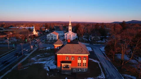 Winter Sunset Over Small Town in Massachusetts - Aerial Slow Push Forward Stock Footage 170590521