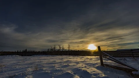Winter sunset time-lapse at an old abandoned farm in rural Alberta, Canada Stock Footage 93283707
