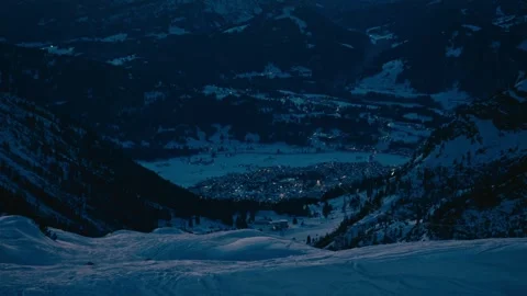 Winter Sunset View Overlooking a Snow Covered Alpine Village in Mountains 库存影片 331170302