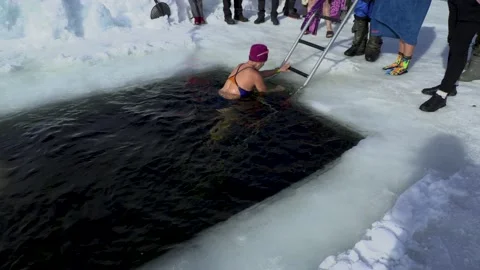 Winter swimming Stock Footage 238923761