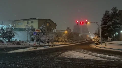 Winter in Tehran Iran traffic jam in the snowy highway at night urban Stock Footage 338171745