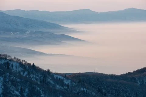 Winter temperature inversion in the mountains of the Trans-Ili Alatau near Al Foto stock